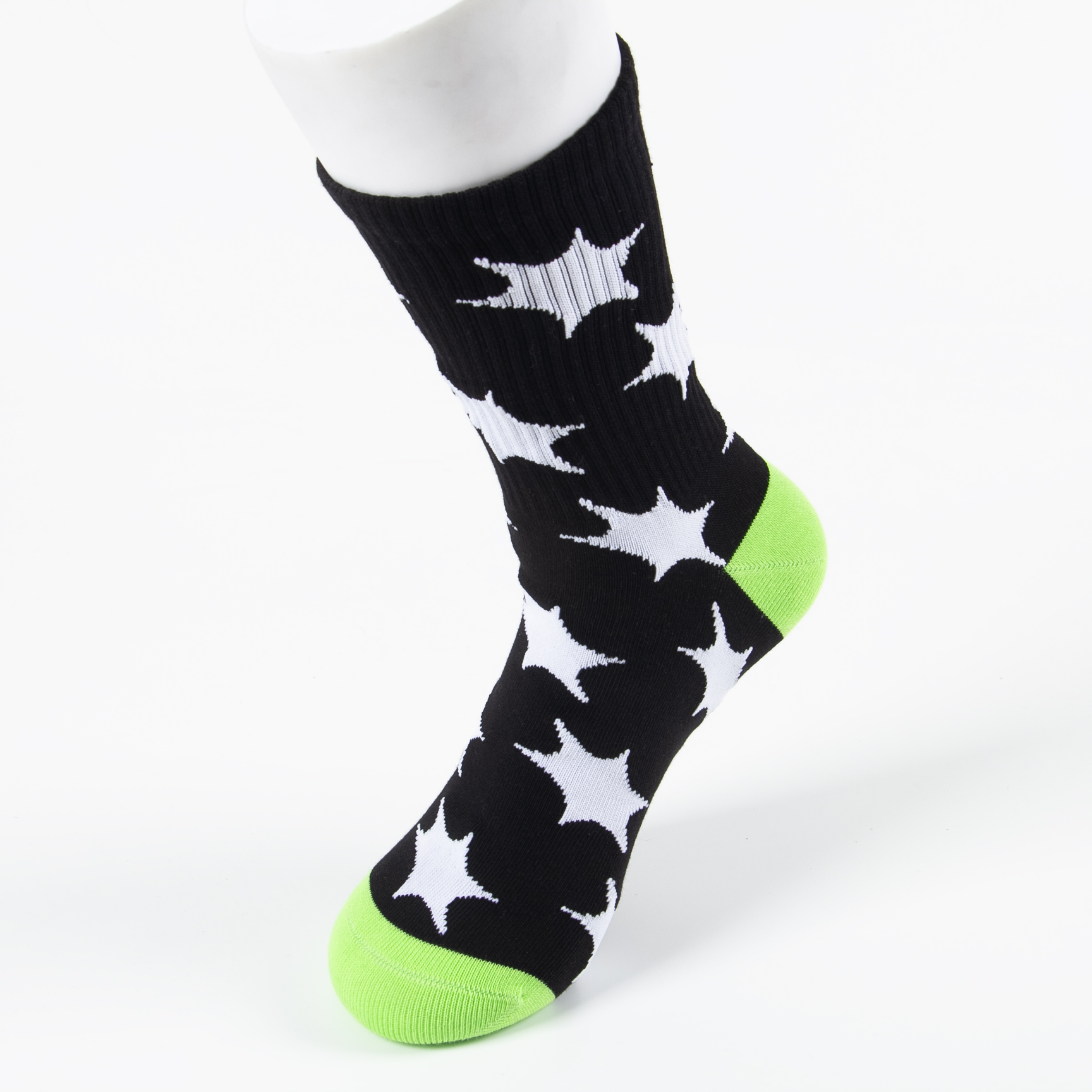 Custom black sports socks with white star pattern and neon green toe and heel